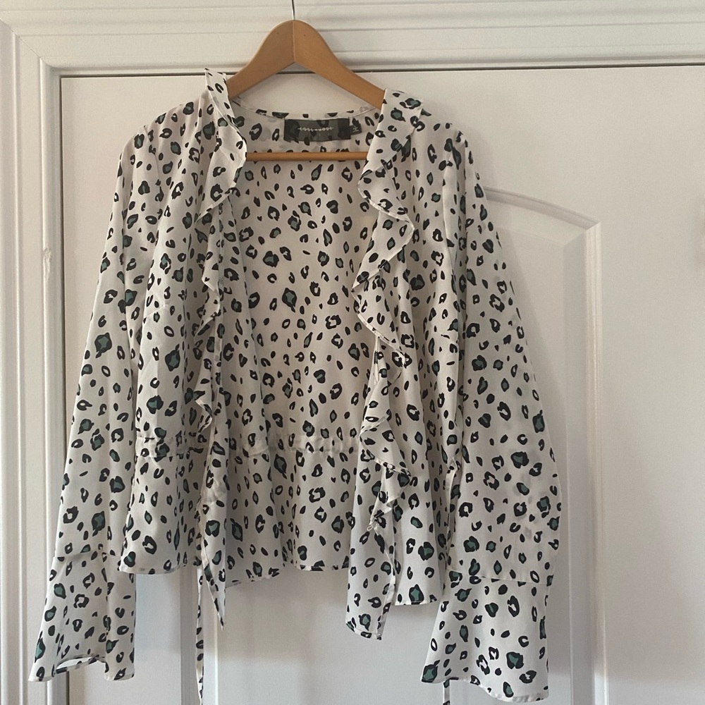 Leopard wrap top size M.  Worn once and cute as can be!